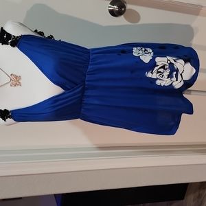 Deep V tank top with rose accent